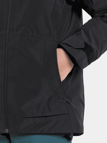 Detail boční kapsy na zip u dětské bundy Didriksons Dolomit
